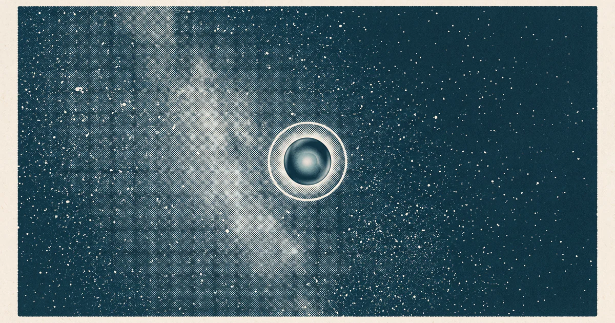 A small dark planet drifts alone through a dense star field, bending one background star's light into a thin bright ring around it.